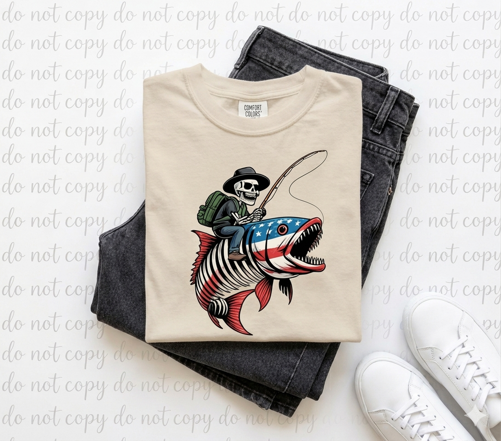 Skeleton Riding Patriot Fish Comfort Colors Graphic Tee